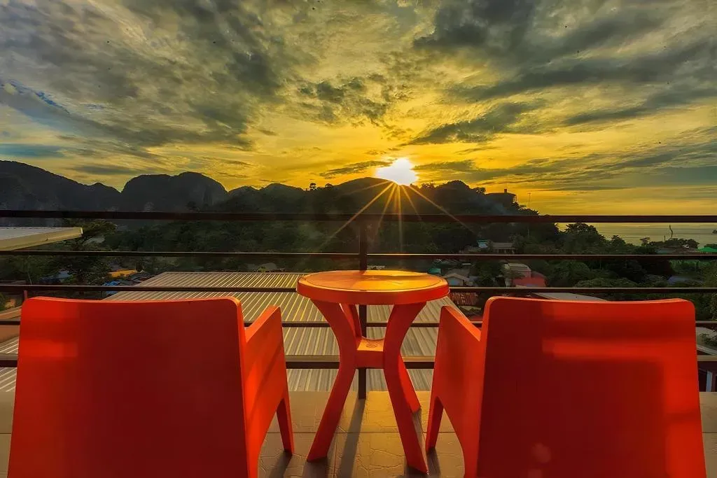 Sunset terrace table with two chairs and panoramic views over the bay